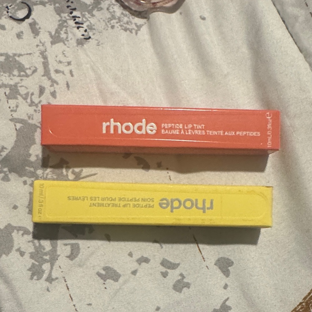 RHODE Peptide Lip Tint in Vibrant Orange and Yellow